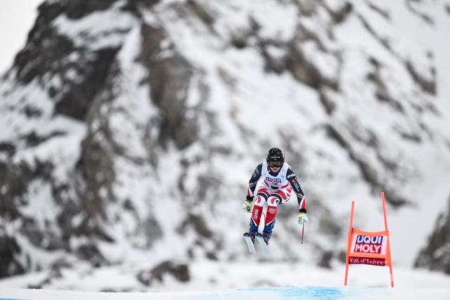 France's Romane Miradoli competes in the women's downhill race part of the FIS Alpine Ski World Cup 2025-2026, in Val d'Isere, south western France, on December 20, 2025. (Photo by Jeff PACHOUD / AFP)