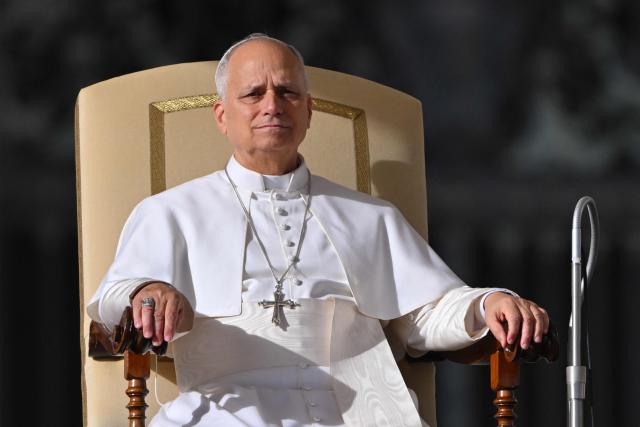 Pope Leo XIV (C) attends the Jubilee Audience at St. Peter's Square in The Vatican on December 20, 2025. (Photo by Andreas SOLARO / AFP)