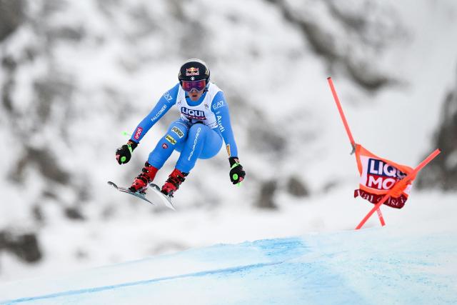 Italy's Sofia Goggia competes in the women's downhill race part of the FIS Alpine Ski World Cup 2025-2026, in Val d'Isere, south western France, on December 20, 2025. (Photo by Jeff PACHOUD / AFP)