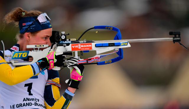 Sweden's Hanna Oeberg fires her rifle during the women's 10km pursuit event of the IBU Biathlon World Cup, in Le Grand Bornand, near Annecy, southeastern France, on December 20, 2025. (Photo by Olivier CHASSIGNOLE / AFP)