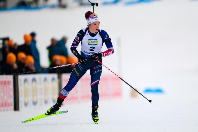 France's Lou Jeanmonnot competes during the women's 10km pursuit event of the IBU Biathlon World Cup, in Le Grand Bornand, near Annecy, southeastern France, on December 20, 2025. (Photo by Olivier CHASSIGNOLE / AFP)