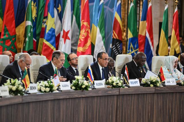 Russia's Foreign Minister Sergey Lavrov (2nd L) and Egypt's Foreign Minister Badr Abdelatty (C) attend the second Ministerial Conference of the Russia-Africa Partnership Forum in Cairo on December 20, 2025. (Photo by Ahmed HASAN / AFP)