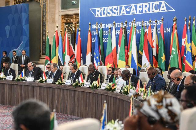 Russia's Foreign Minister Sergey Lavrov (3rd L) and Egypt's Foreign Minister Badr Abdelatty (4th L) attend the second Ministerial Conference of the Russia-Africa Partnership Forum in Cairo on December 20, 2025. (Photo by Ahmed HASAN / AFP)