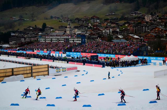 Biathletes compete during the men's 12,5km pursuit event of the IBU Biathlon World Cup, in Le Grand Bornand, near Annecy, southeastern France, on December 20, 2025. (Photo by Olivier CHASSIGNOLE / AFP)