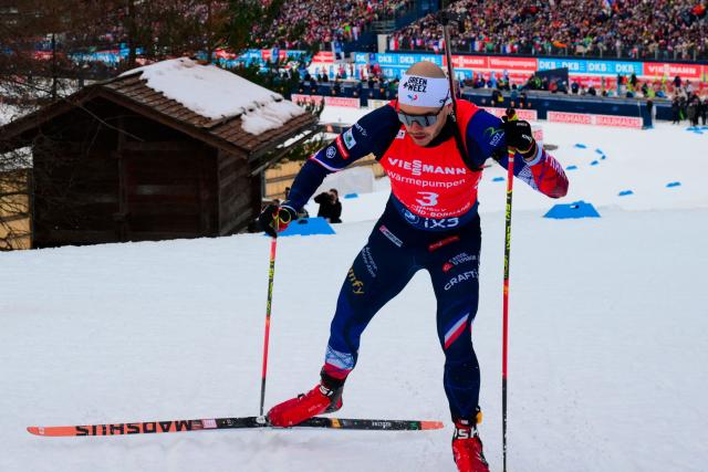 France's Emilien Jacquelin competes during the men's 12,5km pursuit event of the IBU Biathlon World Cup, in Le Grand Bornand, near Annecy, southeastern France, on December 20, 2025. (Photo by Olivier CHASSIGNOLE / AFP)
