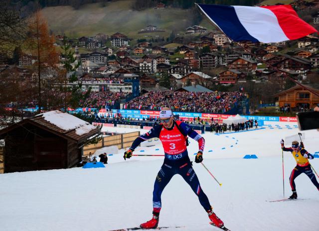 France's Emilien Jacquelin competes during the men's 12,5km pursuit event of the IBU Biathlon World Cup, in Le Grand Bornand, near Annecy, southeastern France, on December 20, 2025. (Photo by Olivier CHASSIGNOLE / AFP)