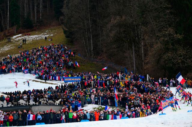 Biathletes compete during the men's 12,5km pursuit event of the IBU Biathlon World Cup, in Le Grand Bornand, near Annecy, southeastern France, on December 20, 2025. (Photo by Olivier CHASSIGNOLE / AFP)