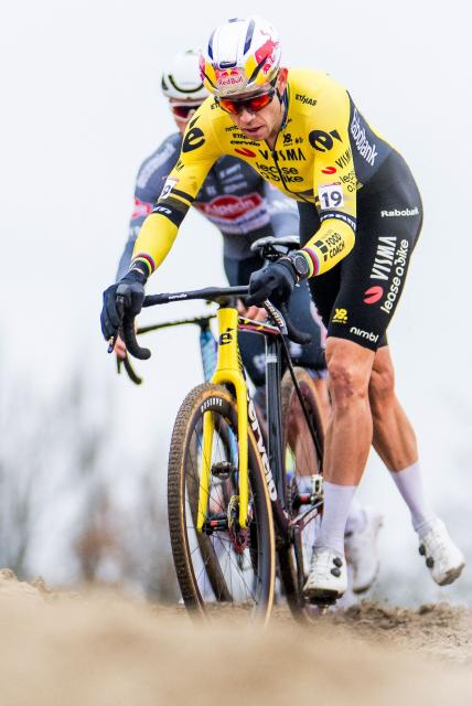 Belgium's Wout van Aert competes during the men's elite race of the cyclo-cross World Cup, stage 5 out of 12 of the UCI World Cup competition, in Antwerp on December 20, 2025. (Photo by JASPER JACOBS / BELGA / AFP) / Belgium OUT
