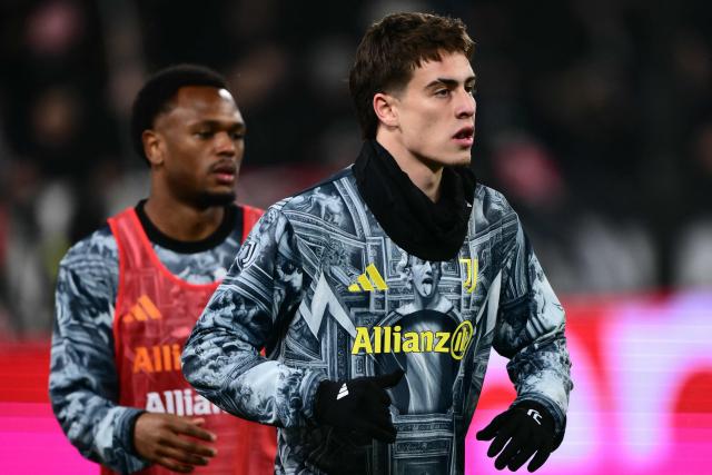 Juventus' Turkish forward #10 Kenan Yildiz (R) warms up ahead of the Italian Serie A football match between Juventus and AS Roma at the Allianz stadium in Turin, northern Italy, on December 20, 2025. (Photo by MARCO BERTORELLO / AFP)
