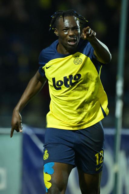 Union's Promise David celebrates after scoring a goal during the Belgian Pro League football match between Royale Union Saint-Gilloise and Zulte Waregem in Brussels, on December 20, 2025. (Photo by DAVID PINTENS / Belga / AFP) / Belgium OUT