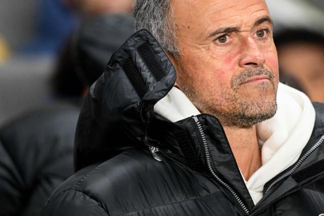 Paris Saint-Germain's Spanish head coach Luis Enrique looks on during the round 64 French cup between Fontenay-le Comte and Paris (PSG) at La Beaujoire stadium, in Nantes, western France, on December 20, 2025. (Photo by Sebastien Salom-Gomis / AFP)