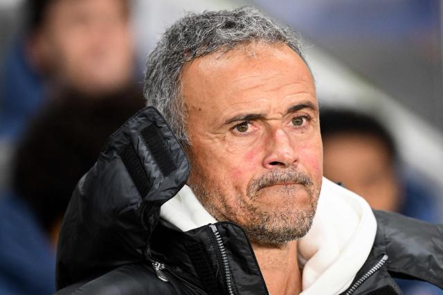 Paris Saint-Germain's Spanish head coach Luis Enrique looks on during the round 64 French cup between Fontenay-le Comte and Paris (PSG) at La Beaujoire stadium, in Nantes, western France, on December 20, 2025. (Photo by Sebastien Salom-Gomis / AFP)