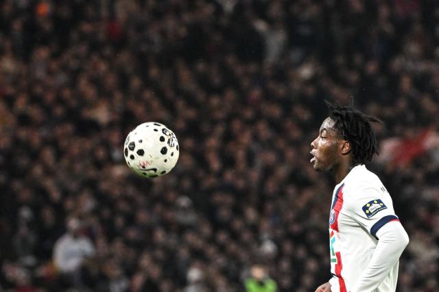 Paris Saint-Germain's French defender #02 David Boly controls the ball during the French Cup round of 64 football match between Fontenay-le-Comte and Paris Saint-Germain (PSG) at La Beaujoire stadium, in Nantes, western France, on December 20, 2025. (Photo by Sebastien Salom-Gomis / AFP)
