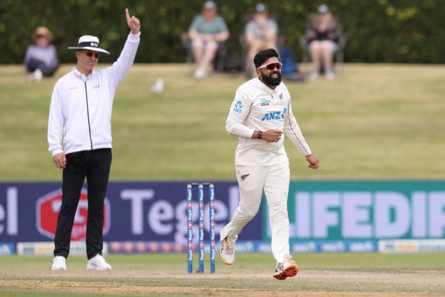 New Zealand’s Ajaz Patel celebrates the wicket of West Indies Jayden Seales during day four of the 3rd international Test cricket match between New Zealand and West Indies at Bay Oval in Mount Maunganui, Tauranga, New Zealand on December 21, 2025. (Photo by Michael Bradley / AFP)
