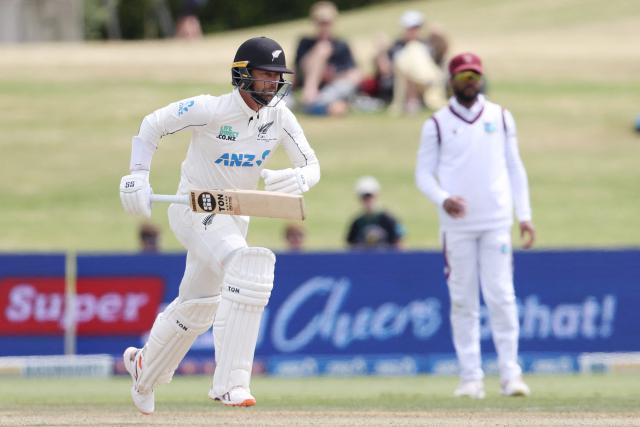 New Zealand’s Devon Conway makes a run during day four of the 3rd international Test cricket match between New Zealand and West Indies at Bay Oval in Mount Maunganui on December 21, 2025. (Photo by Michael Bradley / AFP)