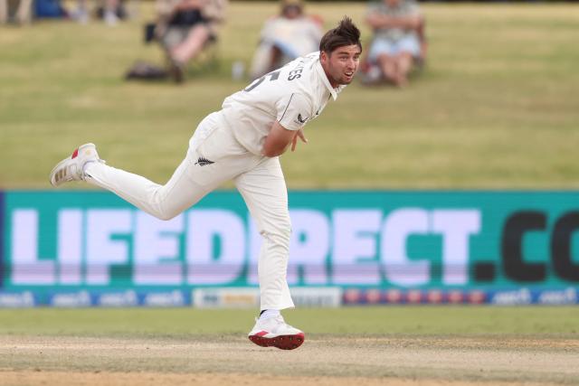New Zealand’s Zak Foulkes bowls during day four of the 3rd international Test cricket match between New Zealand and West Indies at Bay Oval in Mount Maunganui on December 21, 2025. (Photo by Michael Bradley / AFP)