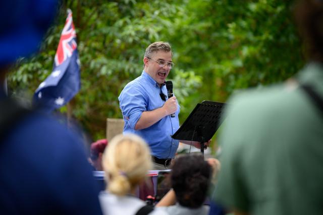 Australian senator and One Nation member Sean Bell speaks during the anti-immigration 'Put Australia First' rally at Prince Alfred Park in Sydney on December 21, 2025, one week after the Bondi Beach mass shooting. (Photo by GEORGE CHAN / AFP)