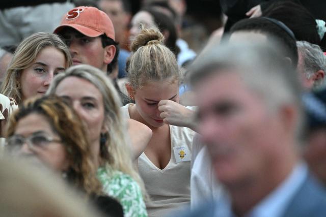Mourners attend the memorial held for the victims of a shooting at Bondi Beach in Sydney on December 21, 2025. A father and his son are accused of spraying bullets into the family-thronged Hanukkah celebration at Sydney's most famous beach on December 14, allegedly inspired by "Islamic State ideology". (Photo by Saeed KHAN / AFP)