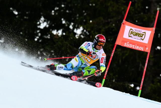 Slovenia's Zan Kranjec competes in the first run of the Men's Giant Slalom event, part of the FIS Alpine Ski World Cup 2025-2026, in Alta Badia, northern Italy, on December 21, 2025. (Photo by Stefano RELLANDINI / AFP)