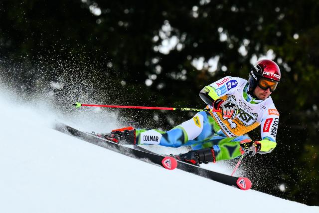 Slovenia's Zan Kranjec competes in the first run of the Men's Giant Slalom event, part of the FIS Alpine Ski World Cup 2025-2026, in Alta Badia, northern Italy, on December 21, 2025. (Photo by Stefano RELLANDINI / AFP)
