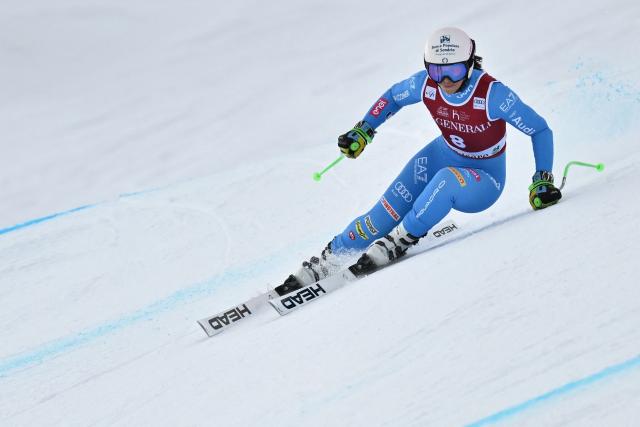 Italy's Elena Curtoni competes in the women's Super G event during the FIS Alpine Ski World Cup 2025-2026, in Val d'Isere, southwestern France, on December 21, 2025. (Photo by Jeff PACHOUD / AFP)