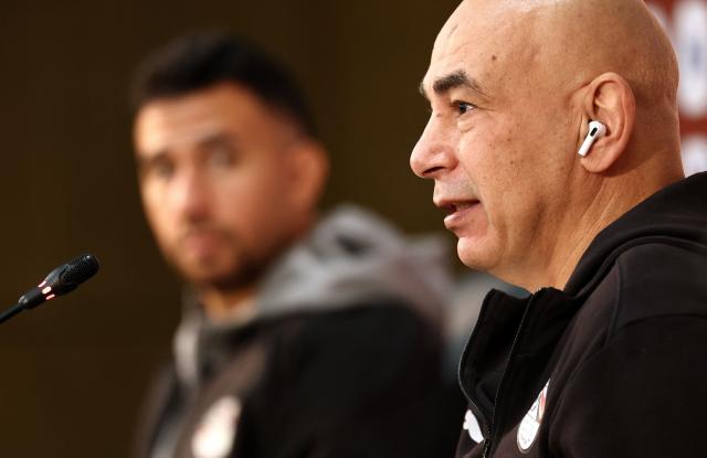 Egypt's head coach Hossam Hassan Egypt's forward #07 Mahmoud Trezeguet (L) and Egypt's head coach Hossam Hassan attend a press conference at the Agadir Grand Stadium, Morocco, on December 21, 2025, on the eve of the 2025 Africa Cup of Nations (CAN) football match between Egypt and Zimbabwe. (Photo by FRANCK FIFE / AFP)