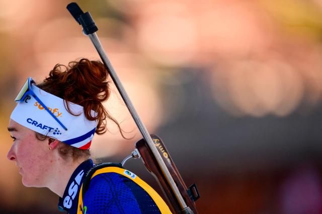 France's Lou Jeanmonnot reacts as she trains during the women's 12,5km mass start event of the IBU Biathlon World Cup, in Le Grand Bornand, near Annecy, southeastern France, on December 21, 2025. (Photo by Olivier CHASSIGNOLE / AFP)