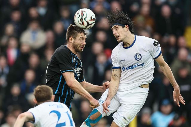 Club's Brandon Mechele and Gent's Omri Gandelman fight for the ball during the Belgian Pro League football match between Club Brugge and KAA Gent, in Bruges, on December 21, 2025. (Photo by BRUNO FAHY / Belga / AFP) / Belgium OUT