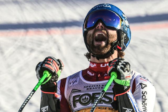 Austria's Marco Schwarz reacts after competing in the second run to win the Men's Giant Slalom, part of the FIS Alpine Ski World Cup 2025-2026, in Alta Badia, northern Italy, on December 21, 2025. (Photo by Stefano RELLANDINI / AFP)
