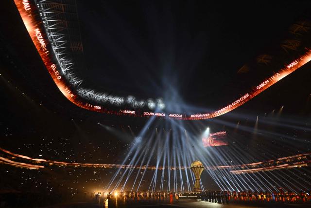 A general view of the show during the opening ceremony of the Africa Cup of Nations (CAN), prior to the Group A  football match between Morocco and Comoros at Prince Moulay Abdellah Stadium in Rabat on December 21, 2025. (Photo by SEBASTIEN BOZON / AFP)