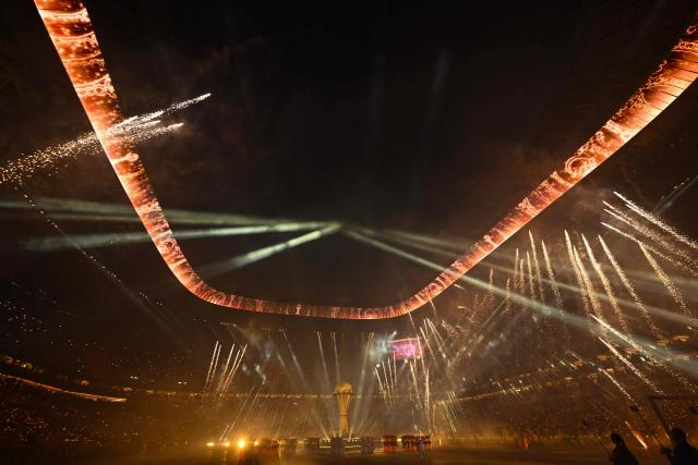 A general view of the show during the opening ceremony of the Africa Cup of Nations (CAN), prior to the Group A  football match between Morocco and Comoros at Prince Moulay Abdellah Stadium in Rabat on December 21, 2025. (Photo by SEBASTIEN BOZON / AFP)