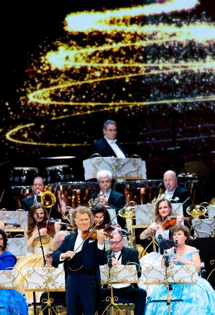 Dutch Violinist and conductor Andre Rieu plays with Johann Strauss Orchestra during the last of his six Christmas concerts at the MECC in Maastricht on December 21, 2025. (Photo by Iris van den Broek / ANP / AFP) / Netherlands OUT