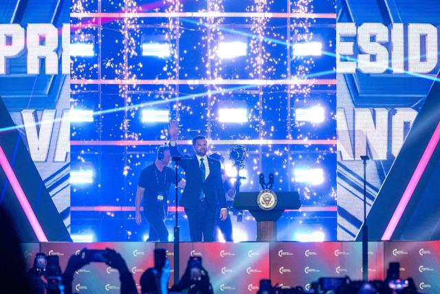 US Vice President JD Vance arrives at the Turning Point's annual AmericaFest conference, in remembrance of late right-wing political activist Charlie Kirk, in Phoenix, Arizona on December 21, 2025. Kirk was shot dead on a Utah college campus in September, sparking a wave of grief among conservatives, and threats of a clampdown on the "radical left" from President Donald Trump. (Photo by Olivier Touron / AFP)