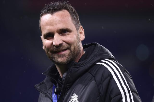 FC Saint-Cyr Collonges French coach Clement Guillot looks on ahead of the French Cup round of 64 football match between - Olympique Lyonnais (OL) and Saint-Cyr-Collonges at the Groupama Stadium in Lyon, south eastern France on December 21, 2025. (Photo by Alex MARTIN / AFP)