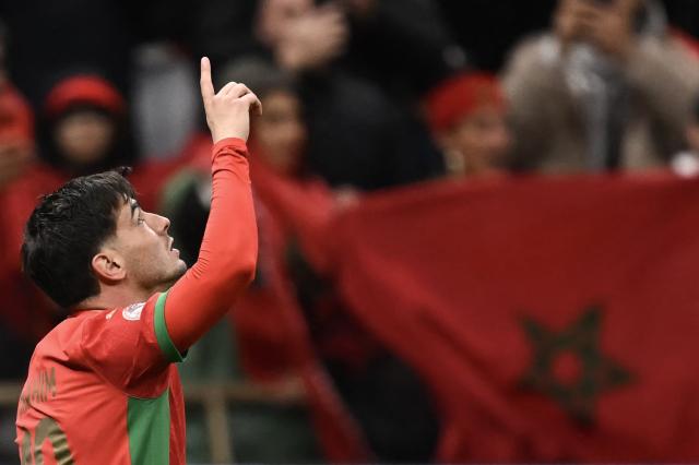 Morocco's forward #10 Brahim Diaz celebrates his goal during the Africa Cup of Nations (CAN) group A  football match between Morocco and Comoros at Prince Moulay Abdellah Stadium in Rabat on December 21, 2025. (Photo by Paul ELLIS / AFP)