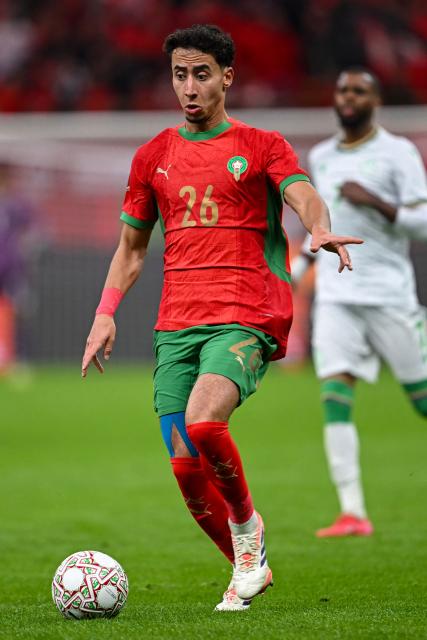 Morocco's defender #26 Anass Salah-Eddine runs with the ball during the Africa Cup of Nations (CAN) group A  football match between Morocco and Comoros at Prince Moulay Abdellah Stadium in Rabat on December 21, 2025. (Photo by Paul ELLIS / AFP)