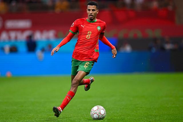 Morocco's midfielder #08 Azzedine Ounahi runs with the ball during the Africa Cup of Nations (CAN) group A  football match between Morocco and Comoros at Prince Moulay Abdellah Stadium in Rabat on December 21, 2025. (Photo by Paul ELLIS / AFP)