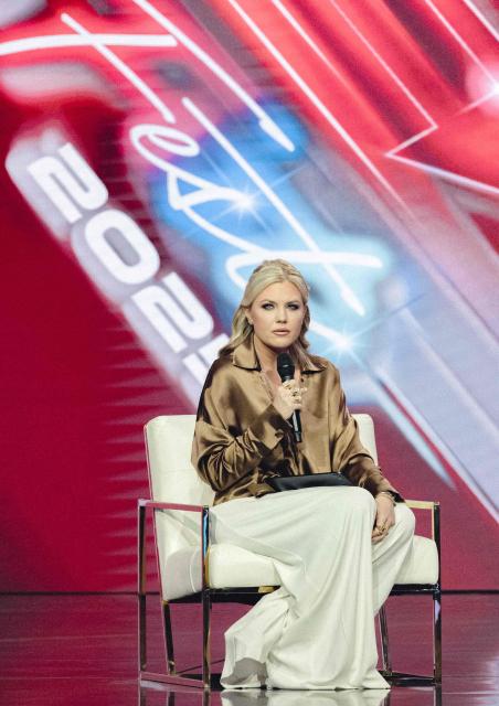 CEO and Chair of the Board of Turning Point USA Erika Kirk speaks onstage during Turning Point's annual AmericaFest conference in Phoenix, Arizona on December 21, 2025. This year’s conference commemorates the late right-wing activist Charlie Kirk, who was fatally shot on a Utah college campus in September, sparking an outpouring of grief among conservatives and prompting President Donald Trump to threaten a crackdown on the "radical left." (Photo by Olivier Touron / AFP)