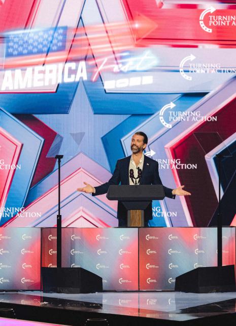 Donald Trump Jr. speaks on stage during Turning Point's annual AmericaFest conference in Phoenix, Arizona on December 21, 2025. This year’s conference commemorates the late right-wing activist Charlie Kirk, who was fatally shot on a Utah college campus in September, sparking an outpouring of grief among conservatives and prompting President Donald Trump to threaten a crackdown on the "radical left." (Photo by Olivier Touron / AFP)