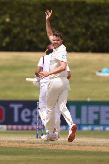 New Zealand’s Jacob Duffy celebrates the wicket of West Indies Brandon King during day five of the 3rd international Test cricket match between New Zealand and West Indies at Bay Oval in Mount Maunganui, Tauranga, New Zealand on December 22, 2025. (Photo by Michael Bradley / AFP)