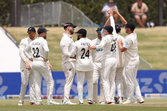 New Zealand players celebrate the wicket of West Indies' Justin Greaves during day five of the 3rd international Test cricket match between New Zealand and West Indies at Bay Oval in Mount Maunganui, Tauranga, New Zealand on December 22, 2025. (Photo by Michael Bradley / AFP)