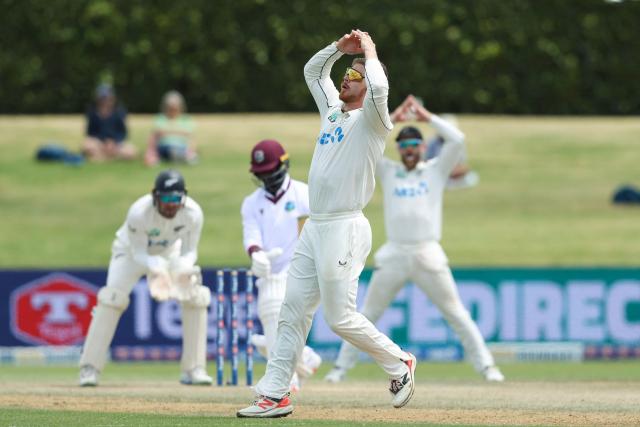 New Zealand’s Glenn Phillips reacts after bowling during day five of the 3rd international Test cricket match between New Zealand and West Indies at Bay Oval in Mount Maunganui, Tauranga, New Zealand on December 22, 2025. (Photo by Michael Bradley / AFP)