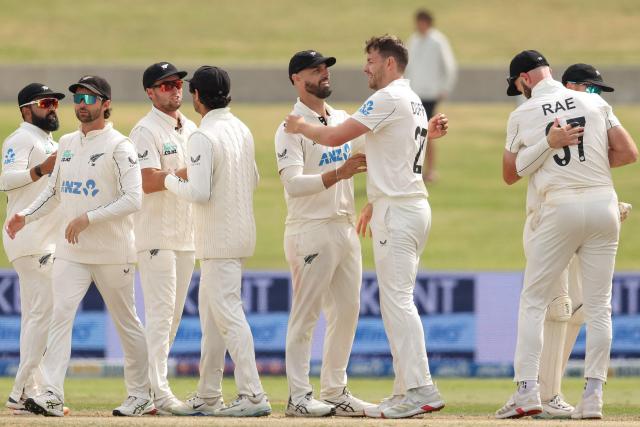New Zealand players celebrate their victory on day five of the 3rd international Test cricket match between New Zealand and West Indies at Bay Oval in Mount Maunganui, Tauranga, New Zealand on December 22, 2025. (Photo by Michael Bradley / AFP)