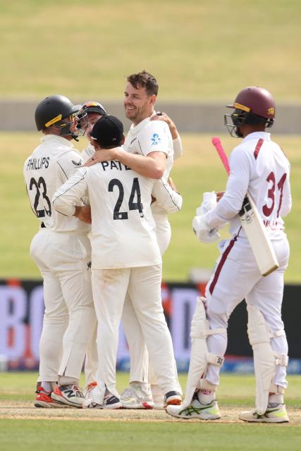 New Zealand’s Jacob Duffy celebrates victory after day five of the 3rd international Test cricket match between New Zealand and West Indies at Bay Oval in Mount Maunganui, Tauranga, New Zealand on December 22, 2025. (Photo by Michael Bradley / AFP)
