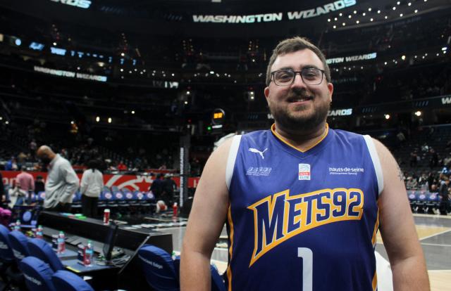 Jacob Ottinger, 27, a lifelong Spurs fan, attends the Spurs–Wizards game at Capital One Arena in Washington, DC, on December 21, 2025. (Photo by Paul NOLP / AFP)