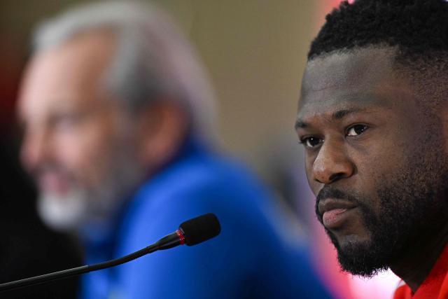 Democratic Republic Of Congo's defender #22 Chancel Mbemba (R) attends a press conference in Rabat, on December 22, 2025, ahead of the Group D match between Democratic Republic of Congo and Benin in the Africa Cup of Nations (CAN) football tournament. (Photo by Gabriel BOUYS / AFP)