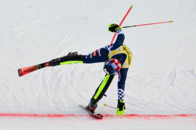 Croatia's Samuel Kolega crosses the finish line as he competes in the second run of the Men's Slalom event, part of the FIS Alpine Ski World Cup 2025-2026, in Alta Badia, northern Italy, on December 22, 2025. (Photo by Stefano RELLANDINI / AFP)