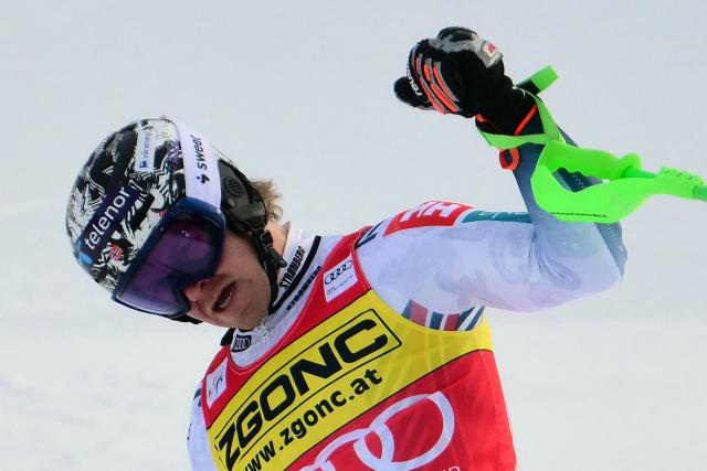 Norway's Timon Haugan reacts after crossing the finish line as he competes in the second run of the Men's Slalom event, part of the FIS Alpine Ski World Cup 2025-2026, in Alta Badia, northern Italy, on December 22, 2025. (Photo by Stefano RELLANDINI / AFP)
