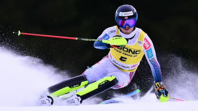 TOPSHOT - Norway's Atle Lie McGrath competes in the first run of the Men's Slalom event, part of the FIS Alpine Ski World Cup 2025-2026, in Alta Badia, northern Italy, on December 22, 2025. (Photo by Stefano RELLANDINI / AFP)