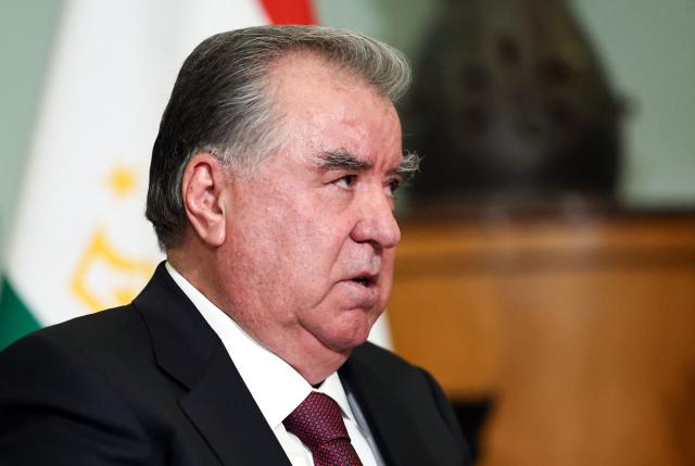 In this pool photograph distributed by the Russian state agency Sputnik, Tajik President Emomali Rakhmon attends a meeting with Russia's President on the sidelines of an informal summit of the Commonwealth of Independent States (CIS) leaders at the State Hermitage Museum in Saint Petersburg on December 22, 2025. (Photo by Alexander KAZAKOV / POOL / AFP)